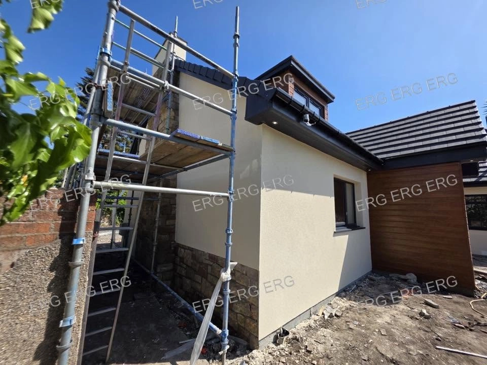 Smooth silicone render finish on residential property